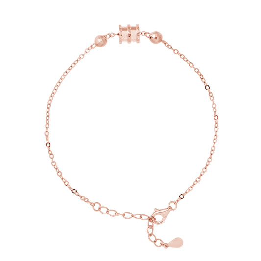 Bracelet motif "TONNEAU" et deux Boules facettées